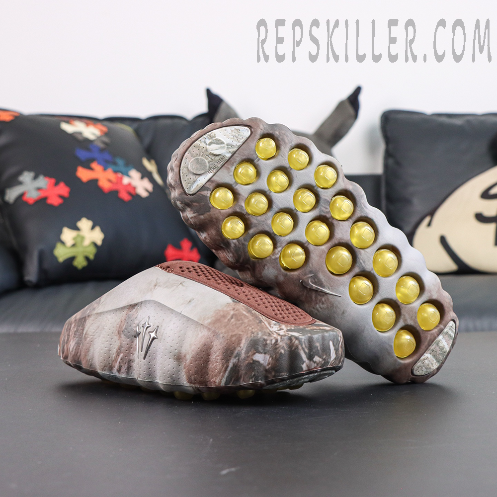 Drake NOCTA x Nike Mind 001 Bronze outsole view featuring the signature yellow circular cushioning pods