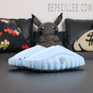 Drake NOCTA x Nike Mind 001 ‘Glacier Blue’ pair side view showcasing the futuristic athletic design in glacier blue