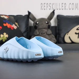 Drake NOCTA x Nike Mind 001 ‘Glacier Blue’ heel detail featuring Nike metallic branding and rounded outsole construction