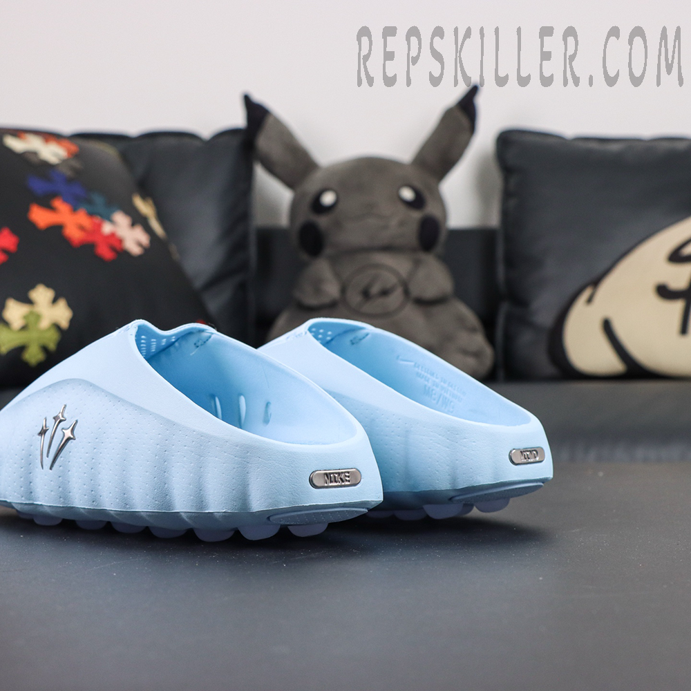 Drake NOCTA x Nike Mind 001 ‘Glacier Blue’ heel detail featuring Nike metallic branding and rounded outsole construction