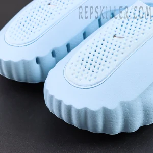 Drake NOCTA x Nike Mind 001 ‘Glacier Blue’ upper detail featuring breathable perforations and Nike Swoosh branding