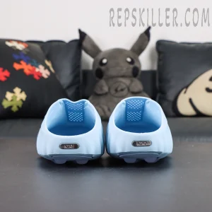 Drake NOCTA x Nike Mind 001 ‘Glacier Blue’ rear view featuring the slip-on silhouette with clean Nike branding