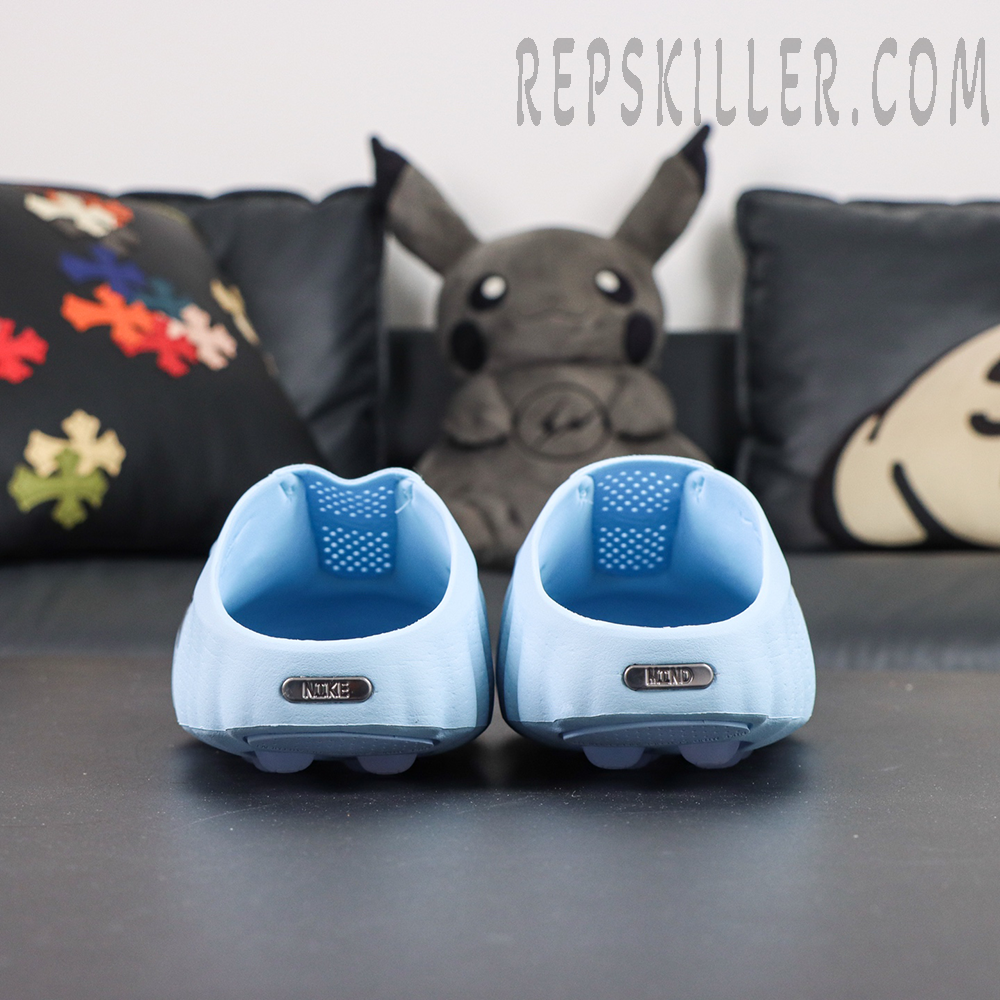 Drake NOCTA x Nike Mind 001 ‘Glacier Blue’ rear view featuring the slip-on silhouette with clean Nike branding