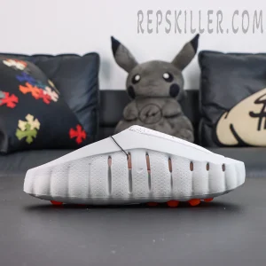 Drake NOCTA x Nike Mind 001 ‘Light Grey’ side view featuring a clean light grey upper, raised NOCTA logo, and streamlined sole construction for a futuristic lifestyle look