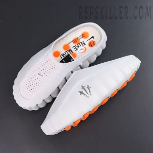 Drake NOCTA x Nike Mind 001 ‘Light Grey’ top view featuring a perforated upper, mini Swoosh, and co-branded insole details