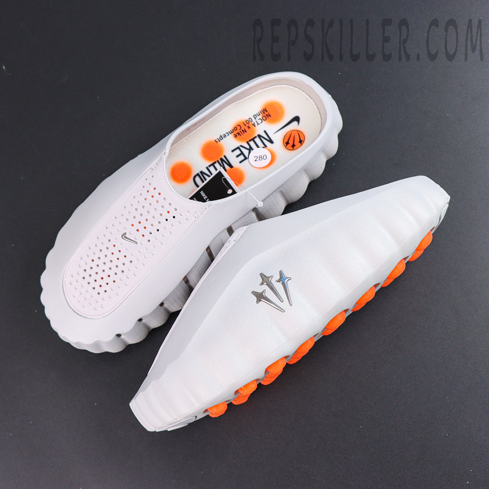 Drake NOCTA x Nike Mind 001 ‘Light Grey’ top view featuring a perforated upper, mini Swoosh, and co-branded insole details