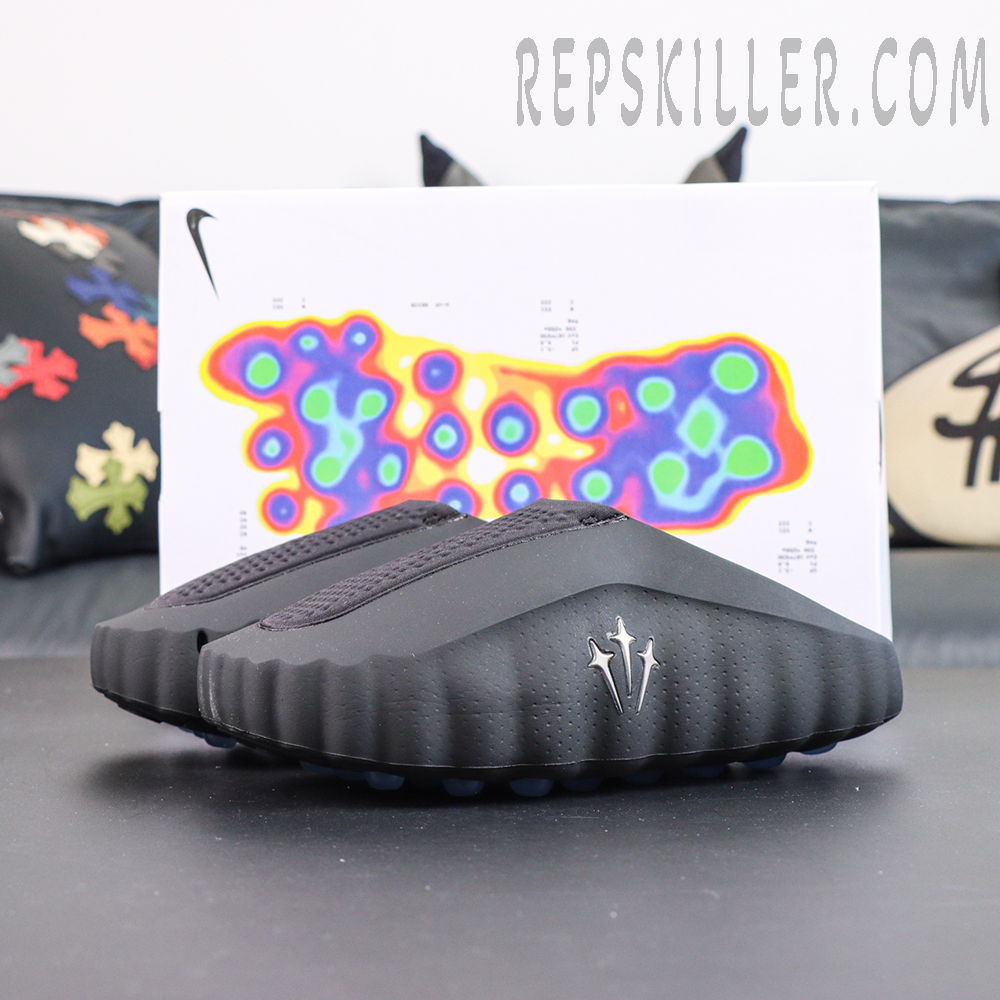 Drake NOCTA x Nike Mind 001 ‘Black’ front view displayed with a NOCTA pressure map backdrop, emphasizing innovative comfort and cushioning