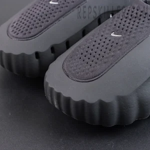 Drake NOCTA x Nike Mind 001 ‘Black’ toe detail featuring a perforated breathable upper with a mini metallic Swoosh for lightweight comfort and premium style