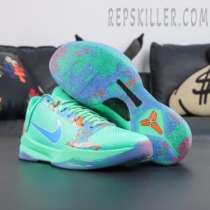 Jalen Brunson x Nike Zoom Kobe 5 Protro NY vs. NY pair display featuring mint green upper, orange blue splatter graphics and translucent outsole