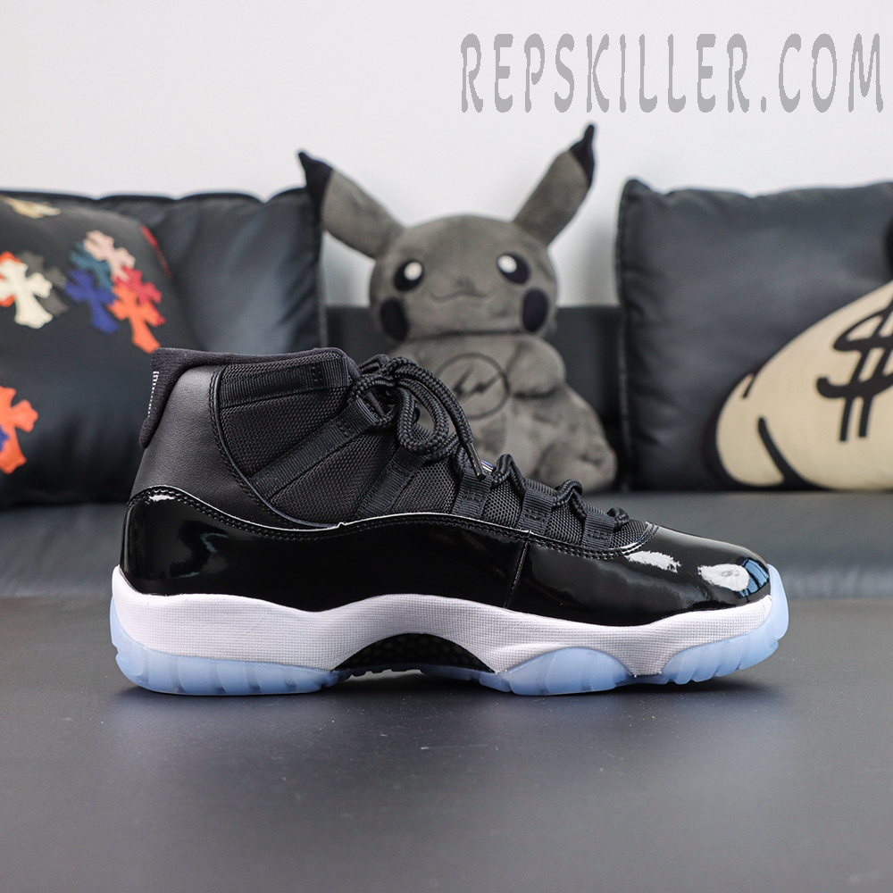 Jordan 11 Retro ‘Space Jam’ lateral side profile featuring black ballistic mesh upper and glossy patent leather mudguard