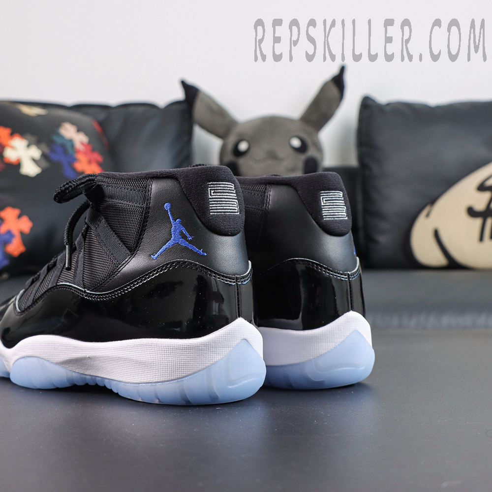 Jordan 11 Retro ‘Space Jam’ rear quarter view featuring blue Jumpman logo and icy translucent outsole