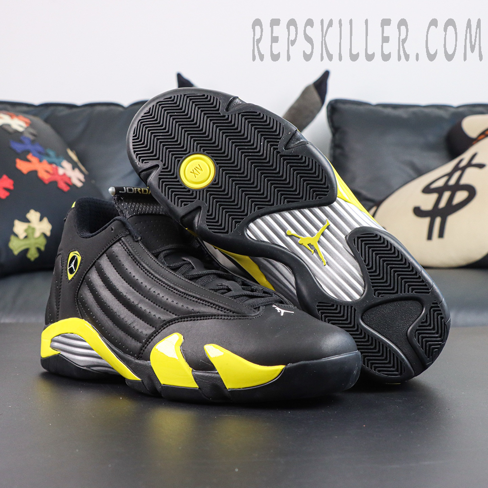Jordan 14 Retro ‘Thunder’ outsole view featuring black traction patterns, yellow stability pod, and Jumpman branding