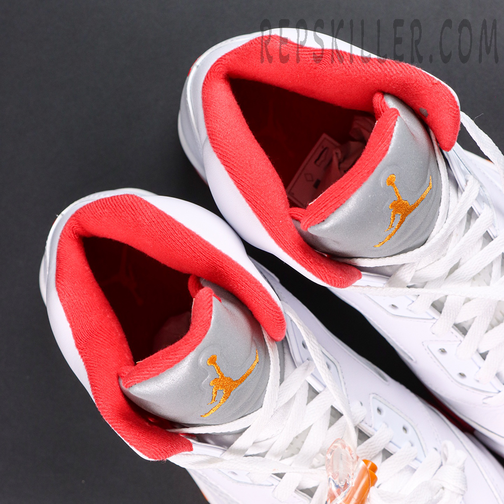 Air Jordan 5 Retro OG Sunset tongue and collar detail featuring reflective silver tongue and orange Jumpman logo