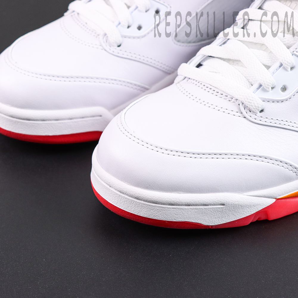 Air Jordan 5 Retro OG Sunset toe detail featuring white leather upper and vibrant red outsole accents