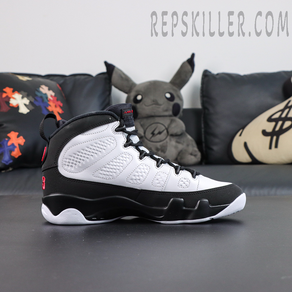 Jordan 9 Retro OG ‘Space Jam’ lateral side profile featuring classic black and white colorway with red Jumpman logo