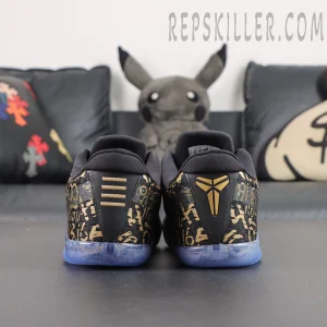 Kobe 11 Protro Low ‘Mamba Day’ heel view featuring black and gold colorway with Kobe signature logo details