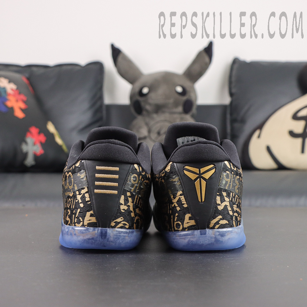 Kobe 11 Protro Low ‘Mamba Day’ heel view featuring black and gold colorway with Kobe signature logo details