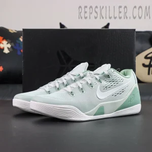 Kobe 9 Low EM Protro “Light Silver” angled view featuring a light silver upper, white midsole, and Kobe signature detail for a clean modern look