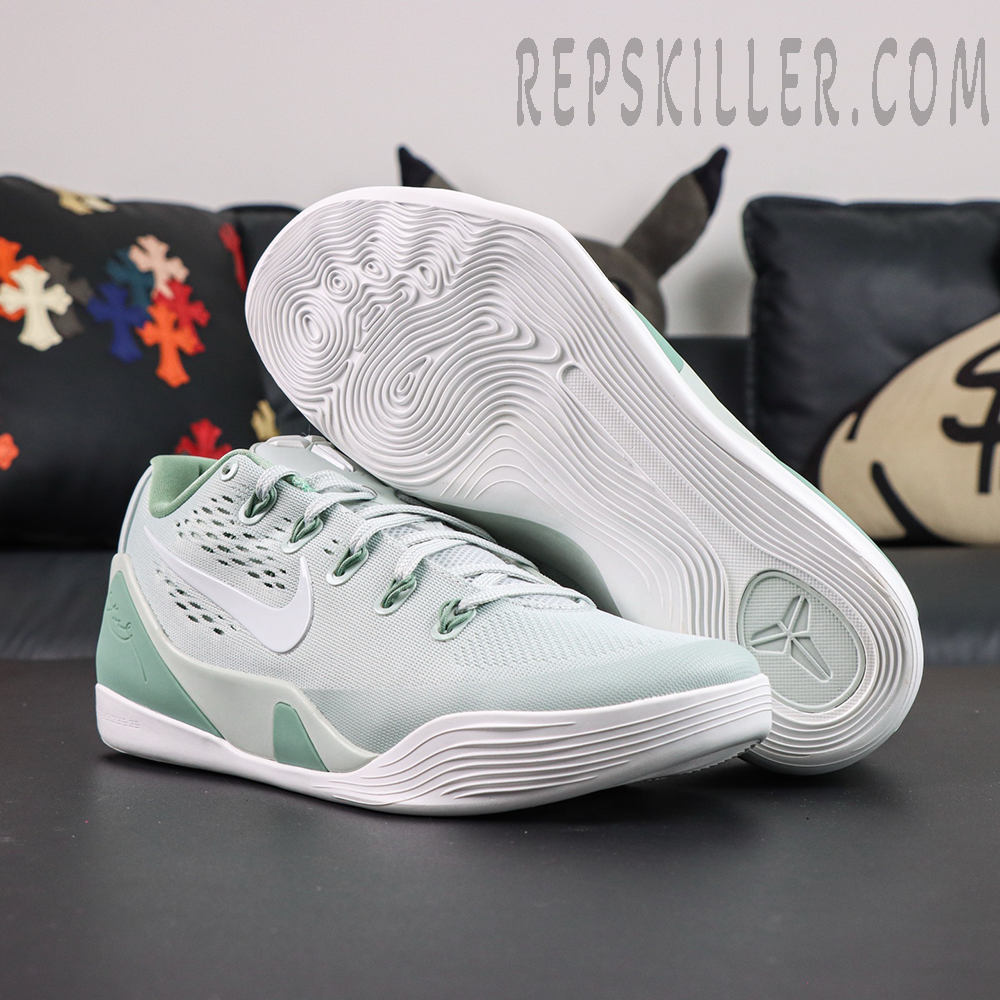 Kobe 9 Low EM Protro “Light Silver” outsole view featuring a full-length wavy traction pattern and Kobe Sheath logo for dependable grip