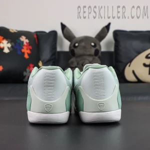 Kobe 9 Low EM Protro “Light Silver” rear view highlighting the sculpted heel support structure with subtle Kobe branding details