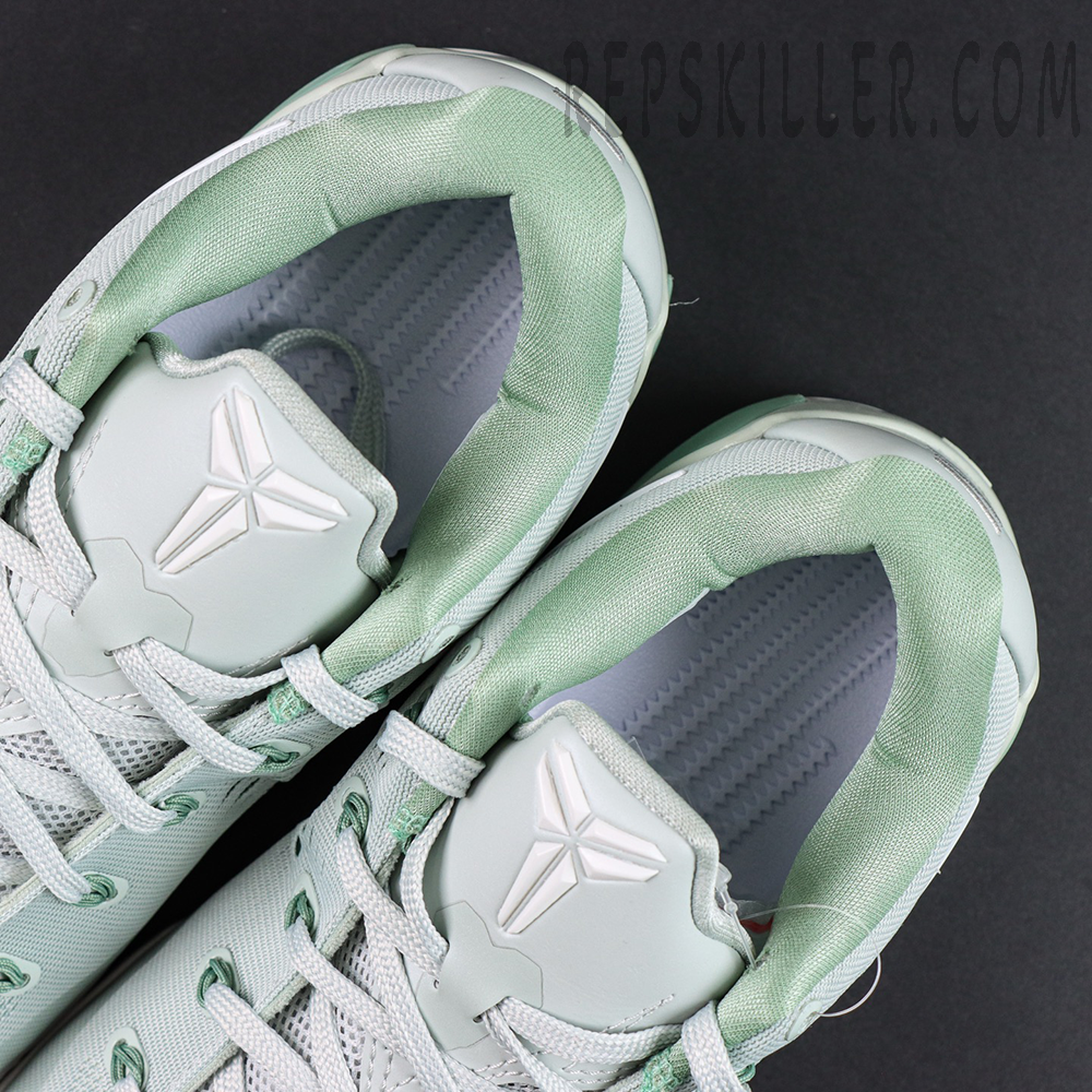 Kobe 9 Low EM Protro “Light Silver” collar and tongue detail featuring a padded lining and Kobe Sheath logo for enhanced comfort and support