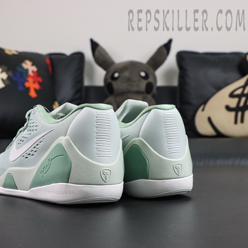 Kobe 9 Low EM Protro “Light Silver” rear angled view featuring the light silver upper and supportive heel counter in a lightweight performance basketball design