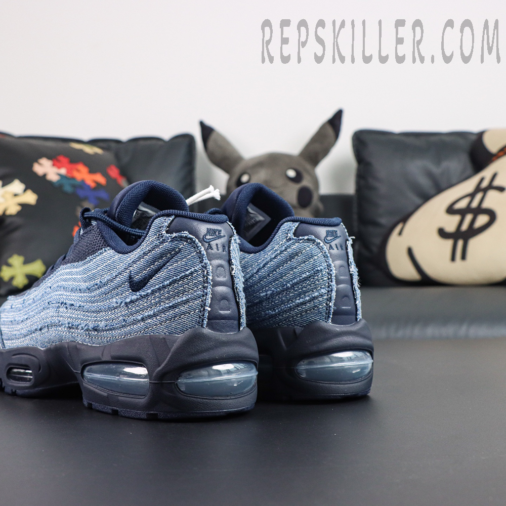 Levi’s x Air Max 95 OG “Obsidian” rear angled detail highlighting frayed denim layers, navy heel construction, and visible Air cushioning