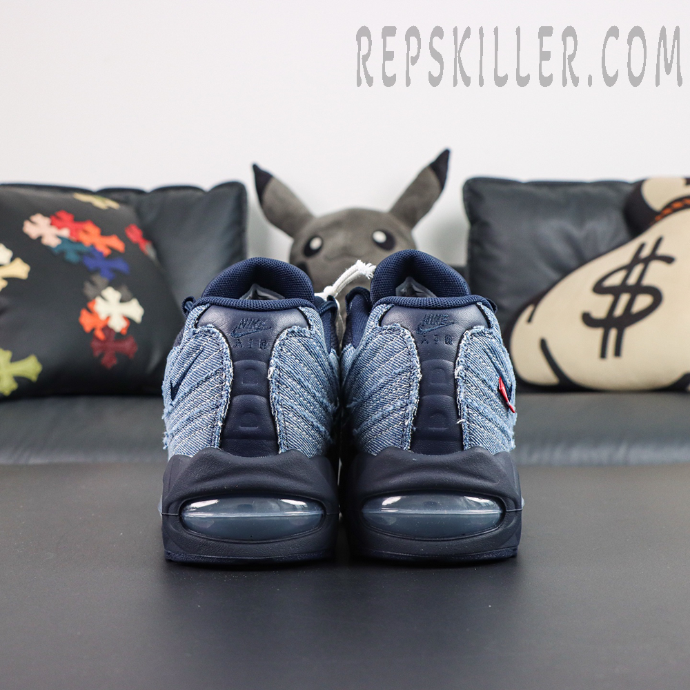Levi’s x Air Max 95 OG “Obsidian” rear view showcasing the denim heel, visible Air Max cushioning, and signature Levi’s red tab detail