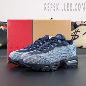 Levi’s x Air Max 95 OG “Obsidian” angled side view featuring layered denim panels, a navy midsole, and visible Air Max cushioning
