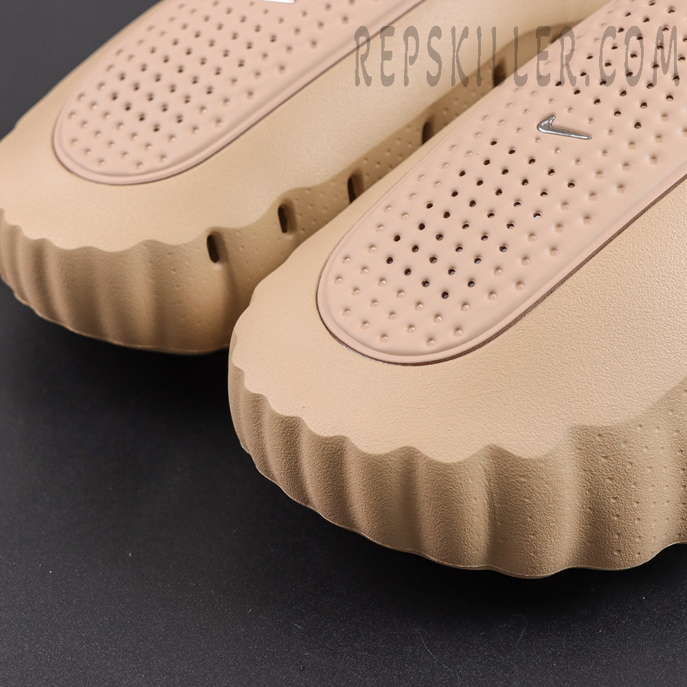 Nike Mind 001 ‘Hemp’ upper detail featuring a tan molded design with perforations and metallic Swoosh