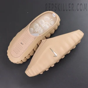 Nike Mind 001 ‘Hemp’ top view featuring a one-piece tan silhouette with metallic Nike Swoosh branding