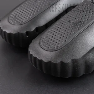 Nike Mind 001 ‘Triple Black’ upper detail featuring textured grip surface and molded one-piece construction