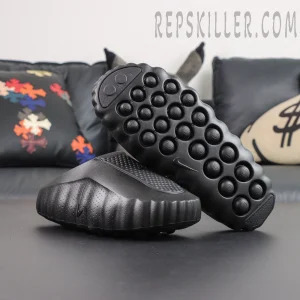 Nike Mind 001 ‘Triple Black’ outsole view featuring full-length rounded traction pods for enhanced grip