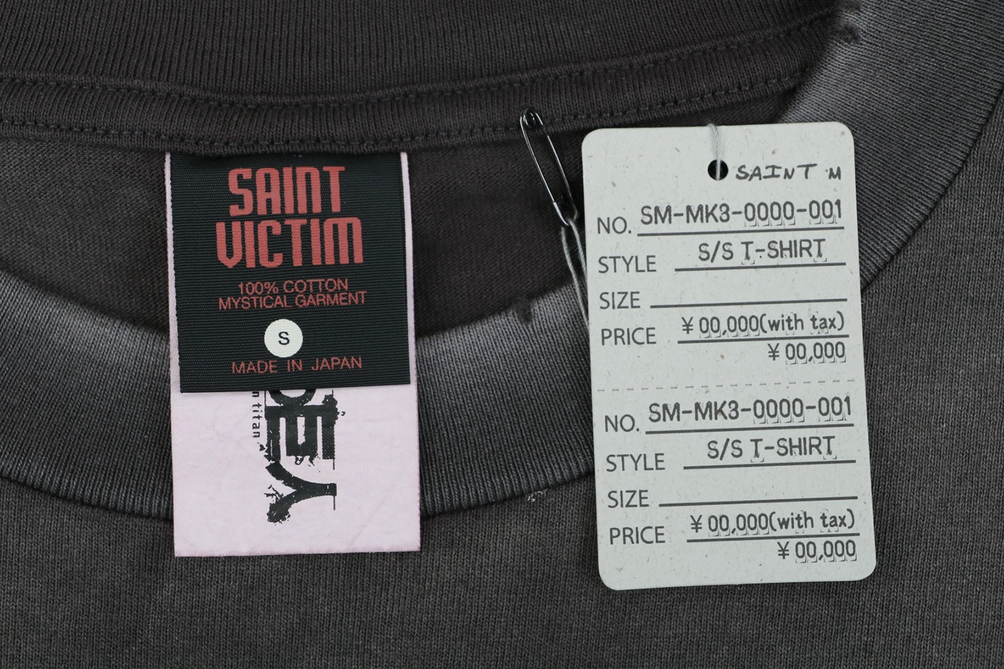 Saint Michael Giant Skeleton Encounter Graphic T-Shirt Brand label