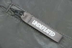 Undefeated Five Stripes Woven Shorts Grey Zipper puller