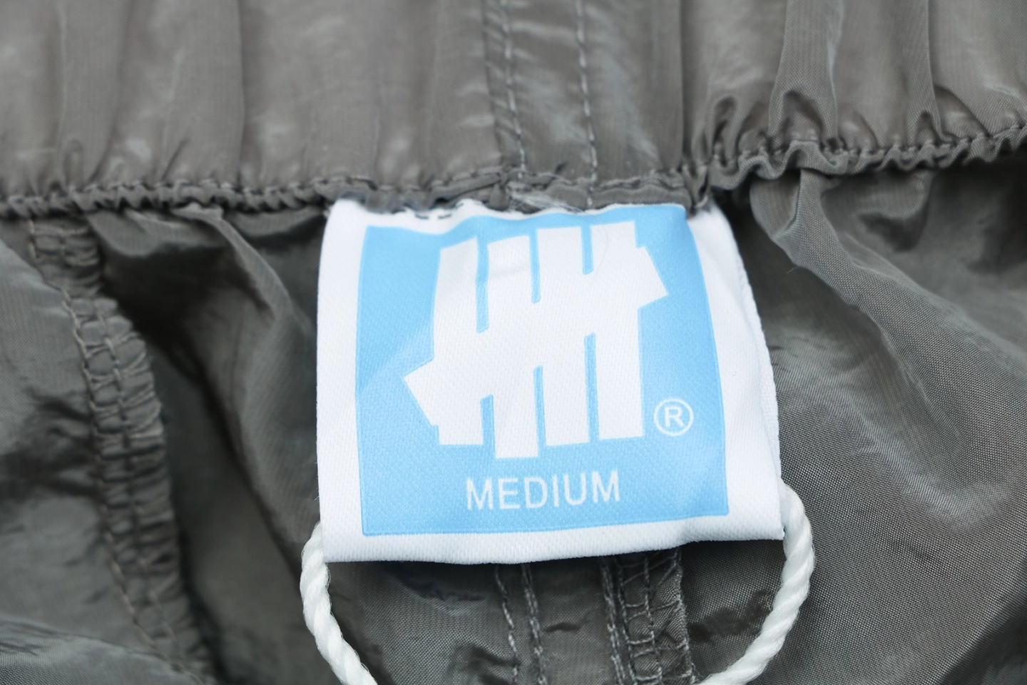 Undefeated Five Stripes Woven Shorts Grey Brand label