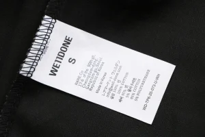 We11done Slash Logo Tailored Wide-Leg Pants Grey Wash label