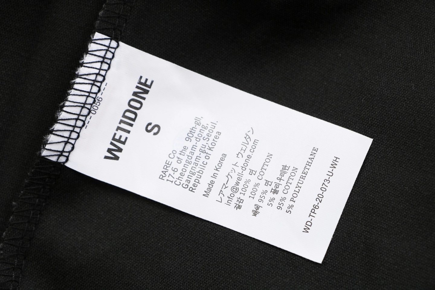 We11done Slash Logo Tailored Wide-Leg Pants Grey Wash label