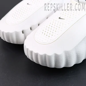 Nike WMNS Mind 001 “Summit White” toe detail featuring perforated ventilation and a metallic Swoosh for a clean premium finish