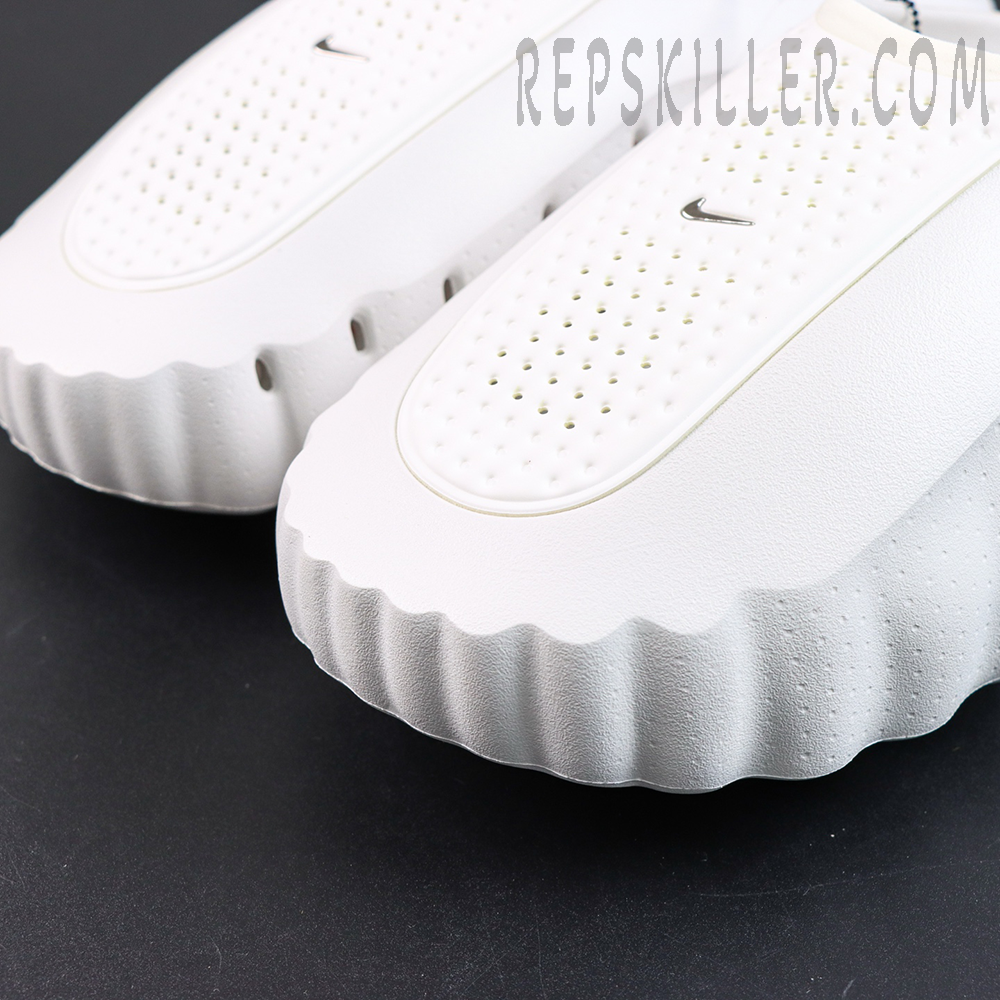Nike WMNS Mind 001 “Summit White” toe detail featuring perforated ventilation and a metallic Swoosh for a clean premium finish