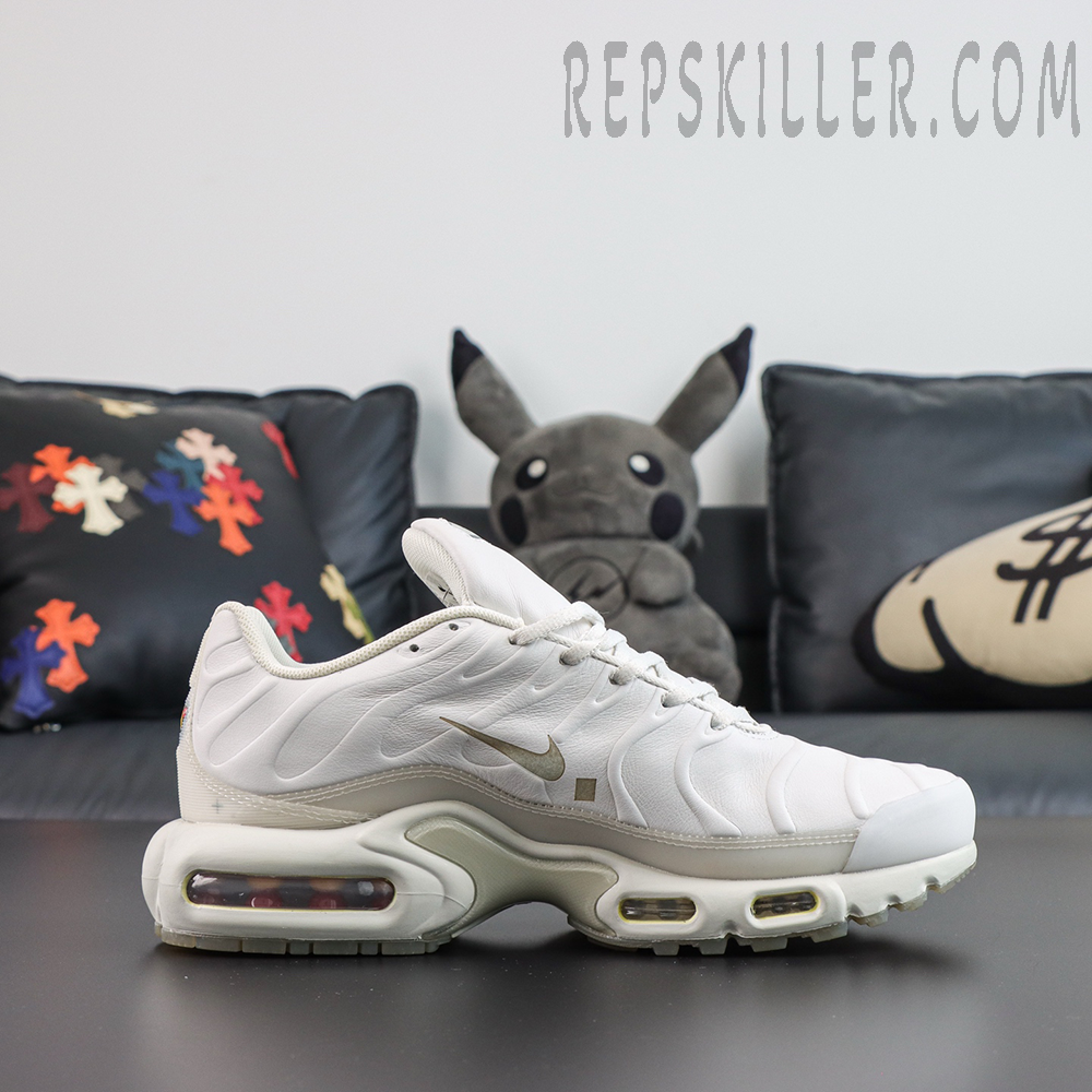 A-COLD-WALL x Nike Air Max Plus ‘Platinum Tint’ side view featuring a white leather upper, mini Swoosh, ACW detailing, and visible Max Air cushioning