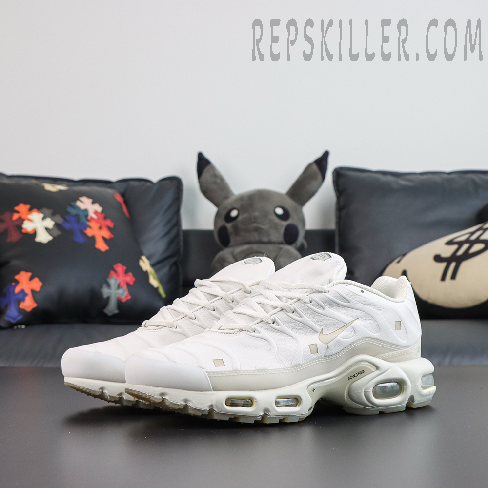 A-COLD-WALL x Nike Air Max Plus ‘Platinum Tint’ front angle view featuring platinum white leather textures, a beige Swoosh, and visible Air cushioning