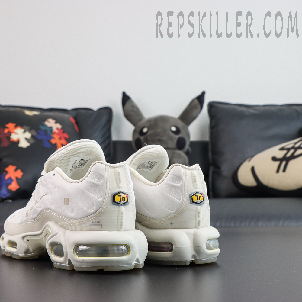 A-COLD-WALL x Nike Air Max Plus ‘Platinum Tint’ rear angle view featuring Tn Air badges, ACW branding, and transparent Max Air cushioning