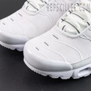 Nike Air Max Plus ‘Triple White’ toe box close-up featuring breathable white mesh, tonal TPU lines, reflective details, and a glossy toe guard