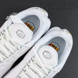 Nike Air Max Plus ‘Triple White’ tongue and interior detail featuring white tongues with hexagonal Air branding and Tn Air insoles