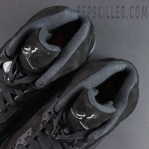 Air Jordan 5 Retro ‘Halloween’ tongue and collar detail featuring a black construction with Halloween-inspired branding elements