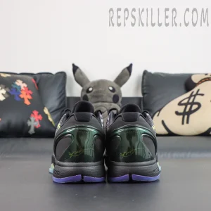 Nike Kobe 6 Protro ‘Coals’ heel view featuring a black upper, dark green translucent heel counter and purple outsole accents