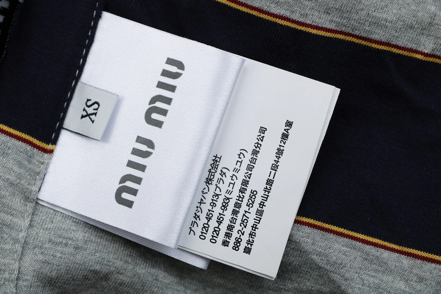 Miu Miu Reversible Striped Hooded Jacket Wash label