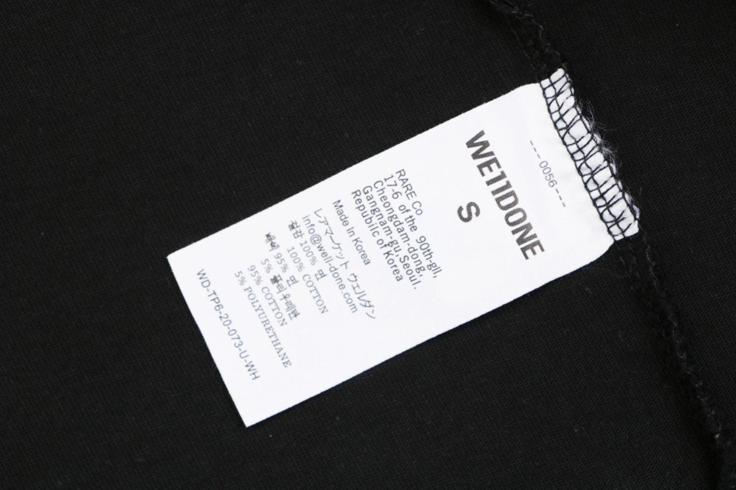 We11done Reversed Slogan Graphic Print T-Shirt Wash label
